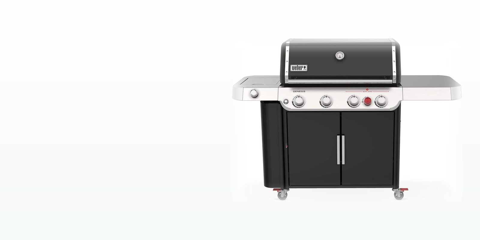 A premium black gas grill in a clean studio setting